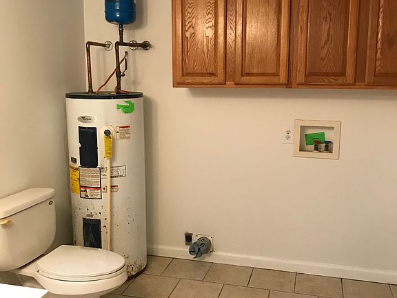 Large laundry room/bathroom.