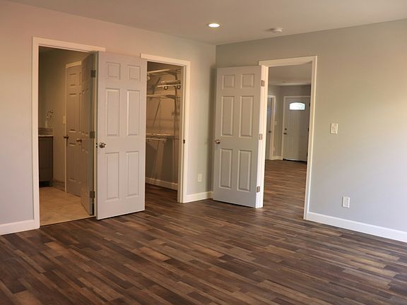 master bedroom with walk in closet