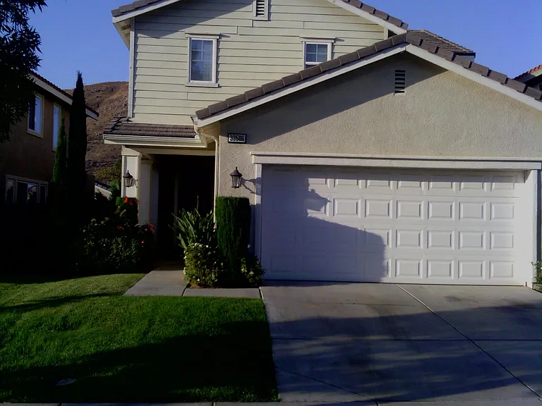 street view with two space driveway parking