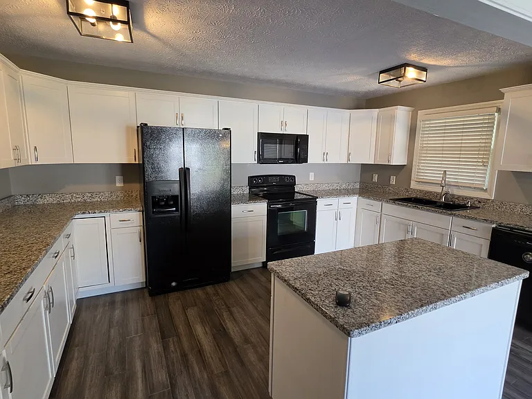 Kitchen, fully updated with granite counter tops.