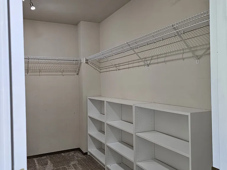 Master closet with some ikea shelves