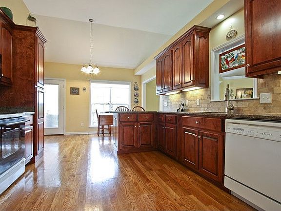 Kitchen with granite countertops and those beautiful floors!