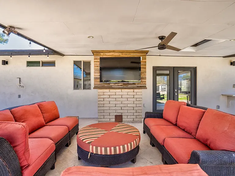 Patio covered sitting area.