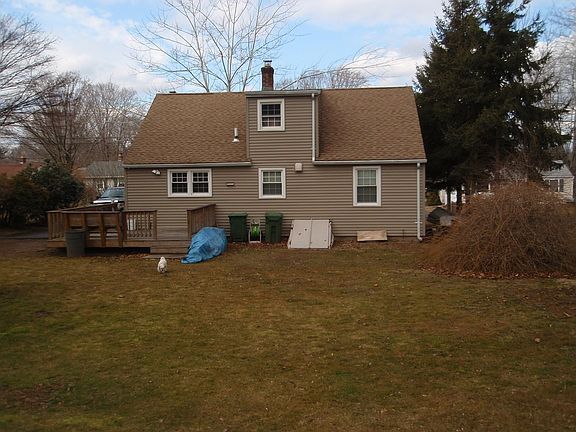 BACK OF THE HOUSE AND YARD 