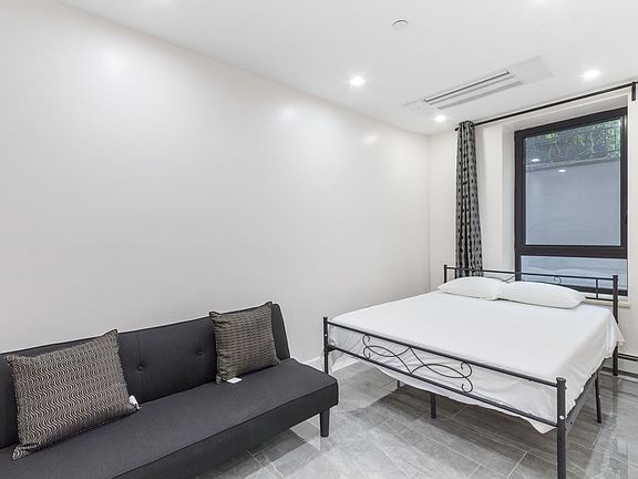 3rd image of 347 E 4th St #3