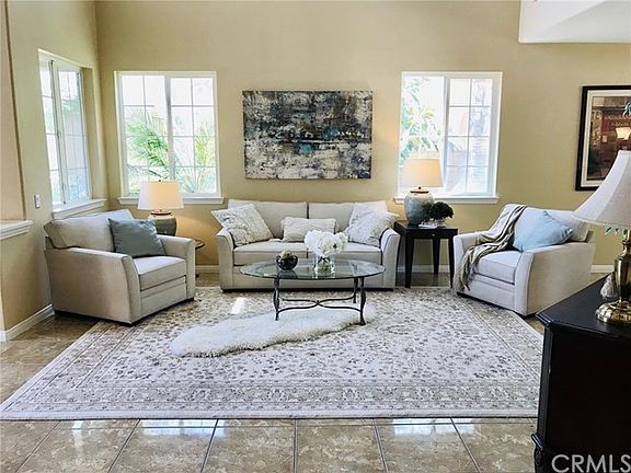 Awesome Living Room with Soaring Ceilings and Loads of Natural Light. This room is great for Formal or Casual Living. Don't Like