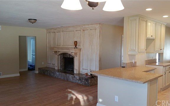Lots of natural light from kitchen to great room. Sit at the counter and enjoy the day! Refinished o