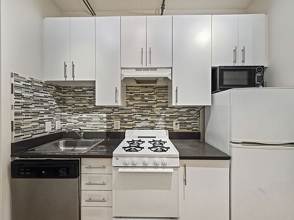 Full-size dishwasher and microwave included in rent.