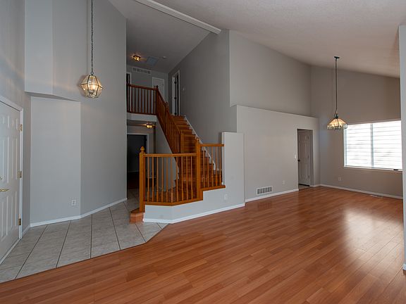 Entryway, living room, and dining room