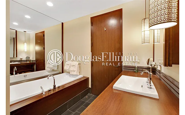 Sold by Douglas Elliman | media 12