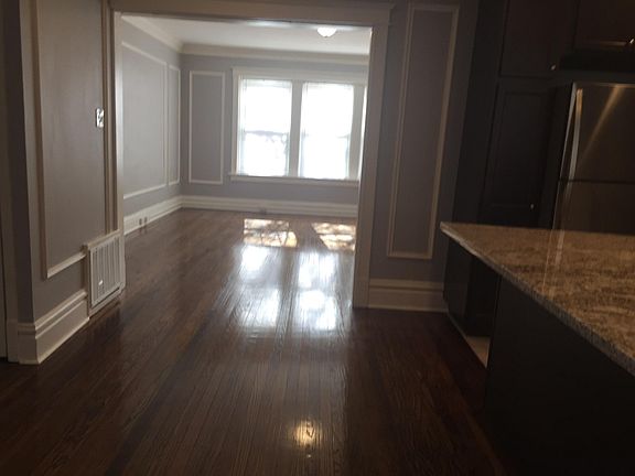 View from dining part of kitchen into the living room