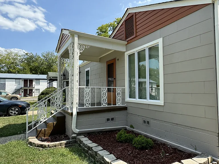 side view of house showcasing picture window