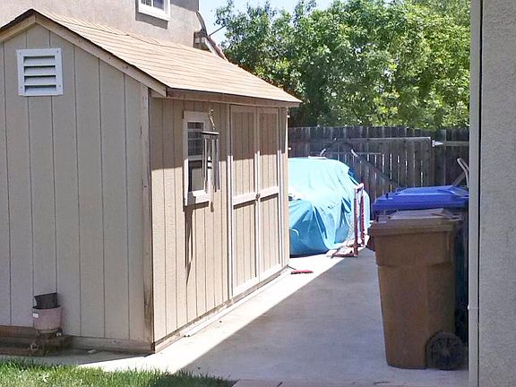 RV pad with storage shed.