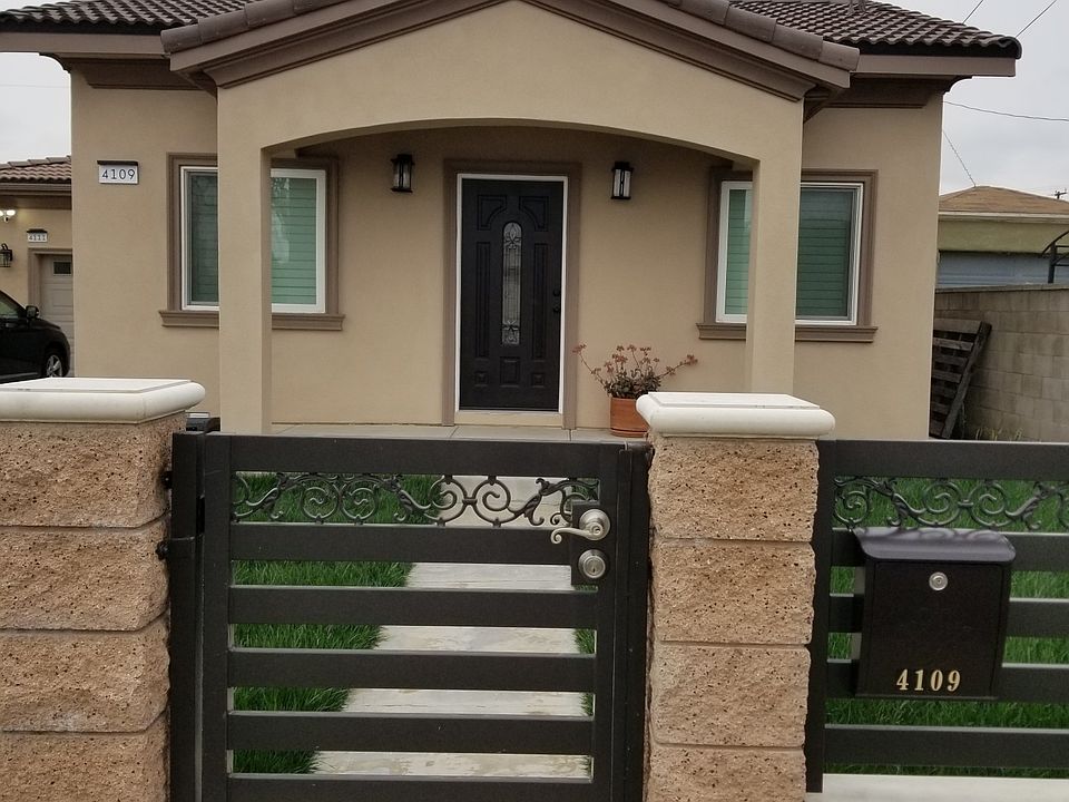 front view of the house behind electric gate