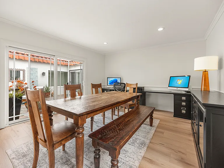 Dining room view into courtyard, can be used as Family Room
