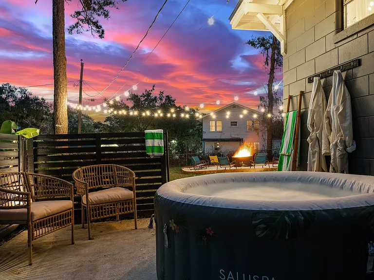 House is complete with everything you need for a relaxing soak including hot tub, pool towels, and robes.