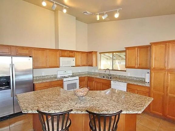 kithchen with updated appliances and granite counter tops