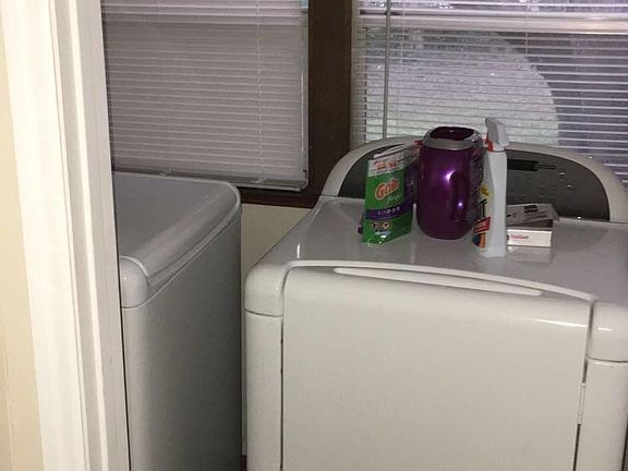 Laundry hookups off back porch