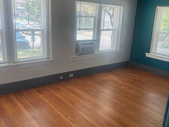 East facing windows with AC unit