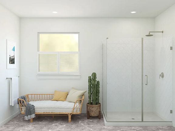 Primary bath with glass shower enclosure