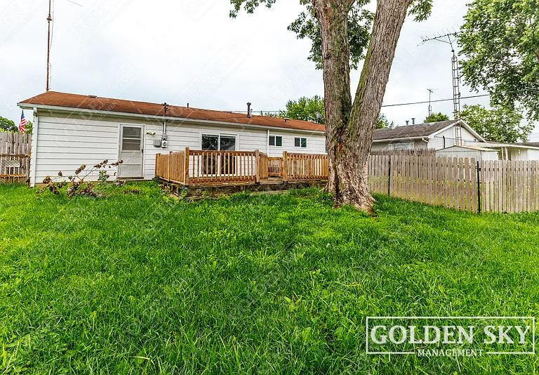 3129 S Opechee Dr — Photo 2