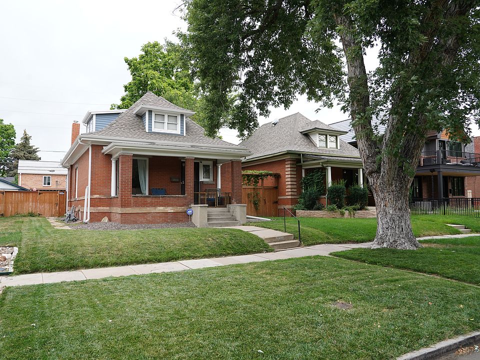 Irrigated front yard with large maple shade tree.