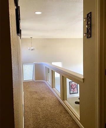 Upstairs hallway overlooking living room