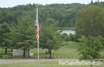 Deck view of Hanbury Lake
						:
						Breathtaking view year-round!