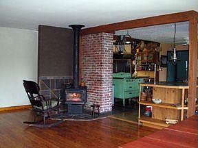 main house great room with wood burning stove