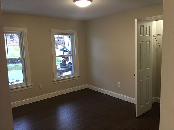 Bedroom with closet and new windows