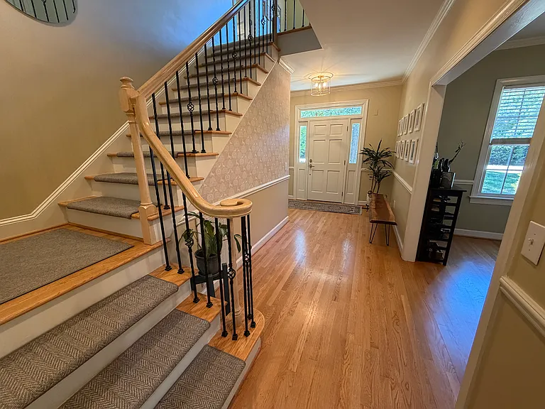 Foyer/staircase (dining room on right)