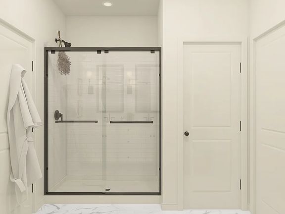 Primary bath with glass shower enclosure