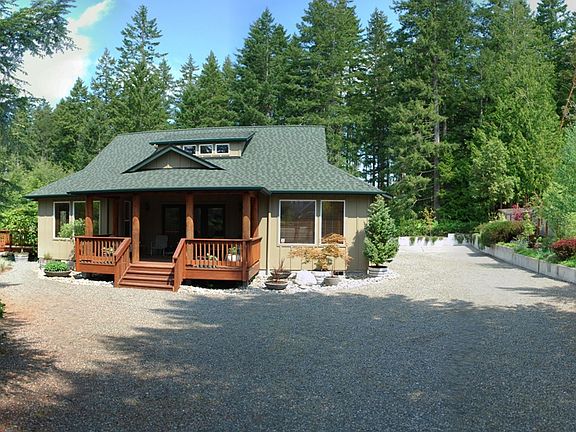 GORGEOUS private setting offers low maintenance landscape and borders 100 acre Girl Scott Camp