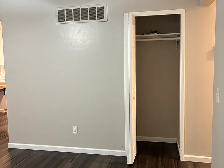 Ample storage for coat closet. Most mid-size totes fit on the top rack!