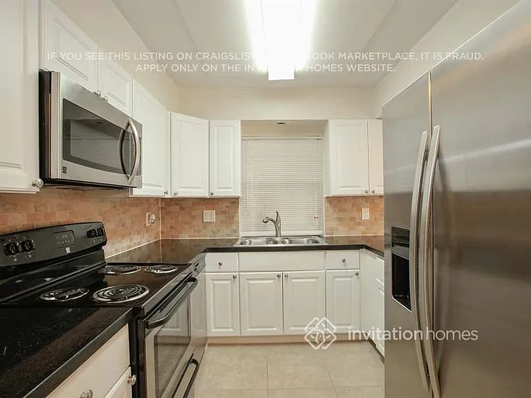 9361 NW 37th Ct — Photo 7