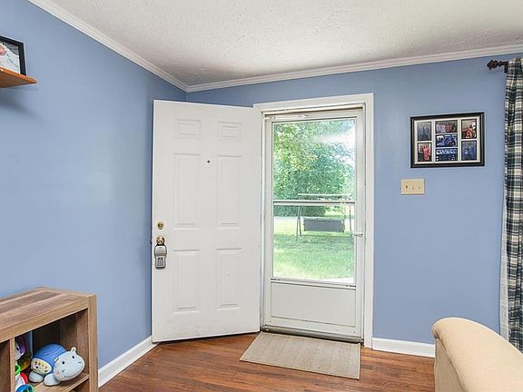 Welcome home!  Gorgeous hardwoods greet you.  Crown molding too!