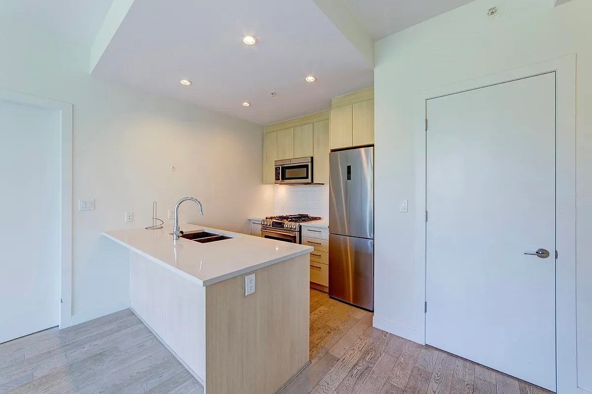 Building Photo - 9060 University Cres #1XX