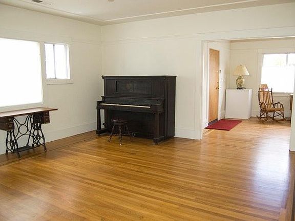 Living room or dining room with piano
