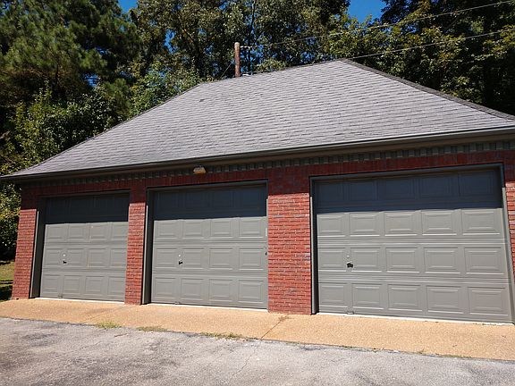 3 car garage with upstairs