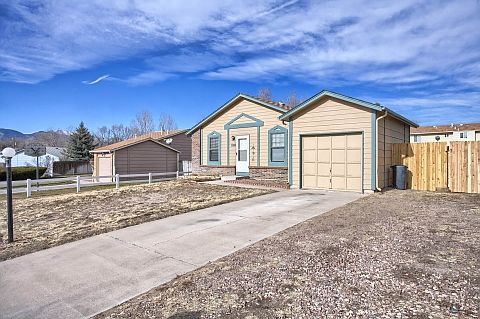 Side view showing lots of parking & space between homes.