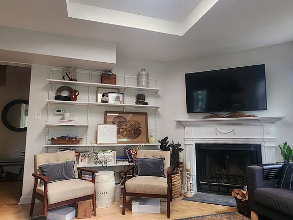 Living area with built in bookshelves