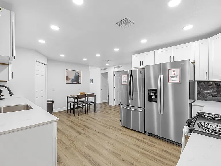 Large beautiful kitchen with two refrigerators