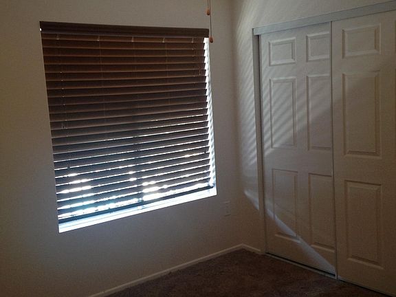 Bedroom #1 - New carpet, blinds, ceiling fan.