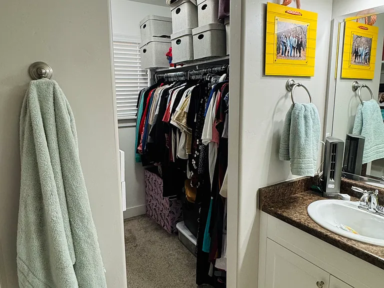 Master walk in closet off master bath