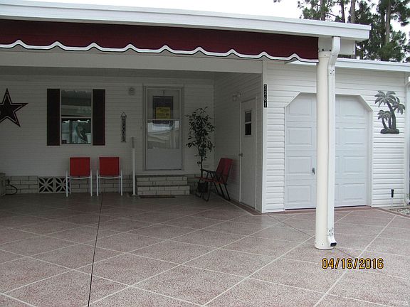 ATTACHED GOLF CART GARAGE