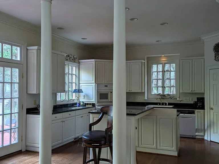 View into the Kitchen area with Kitchen Island.
