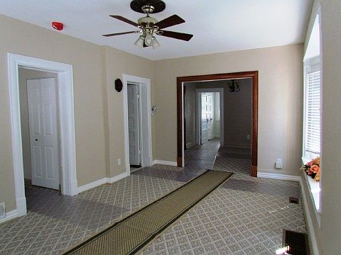Living room, view to dining room.