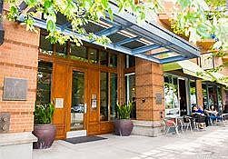 Entrance off first Ave next to Macrina Bakery & Belltown Pizza
