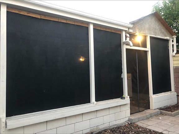 Entrance to private patio space. Is semi enclosed to keep bugs and flys out