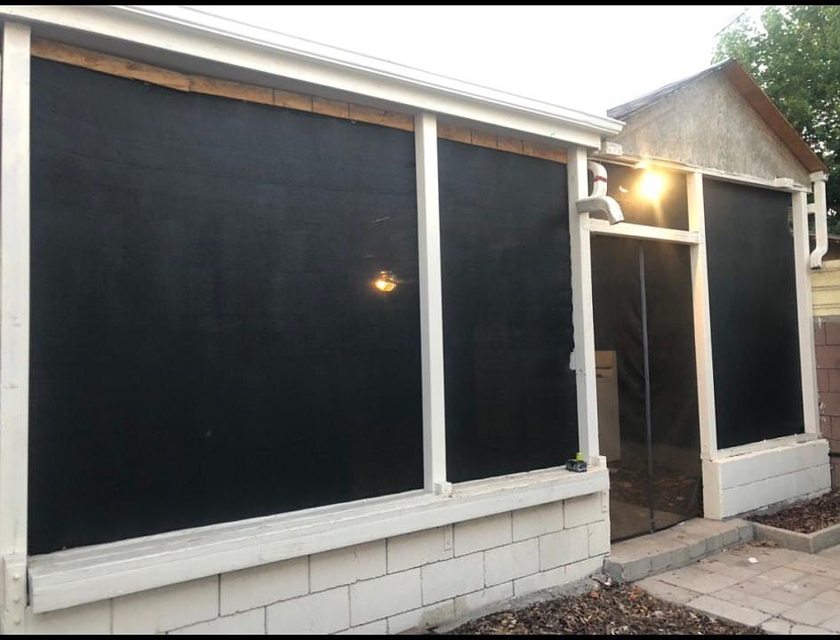 Entrance to private patio space. Is semi enclosed to keep bugs and flys out